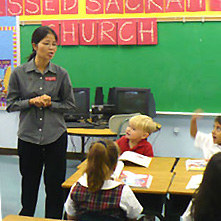 Sister My Hanh Tran with her young students