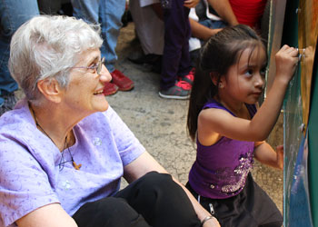 Sister Lourdes with child in Mexico